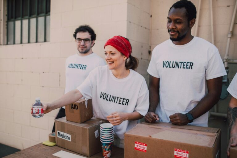 volunteers passing out waters